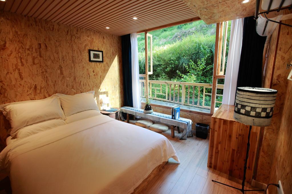 Tong Sang Art Hotel Liping Oda fotoğraf