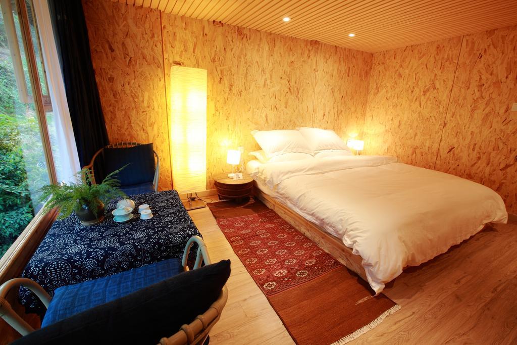 Tong Sang Art Hotel Liping Oda fotoğraf